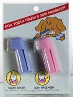 Cepillo de dientes para perros de dedo.