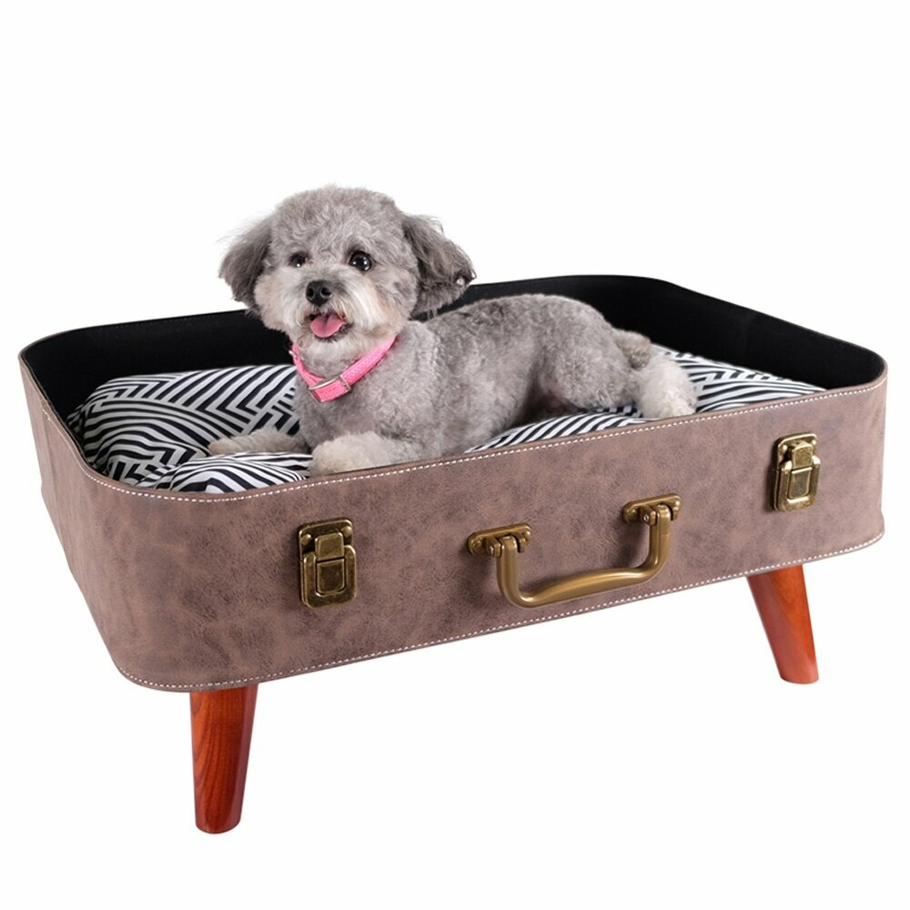 Preciosa cama para perros y gatos en forma de maleta
