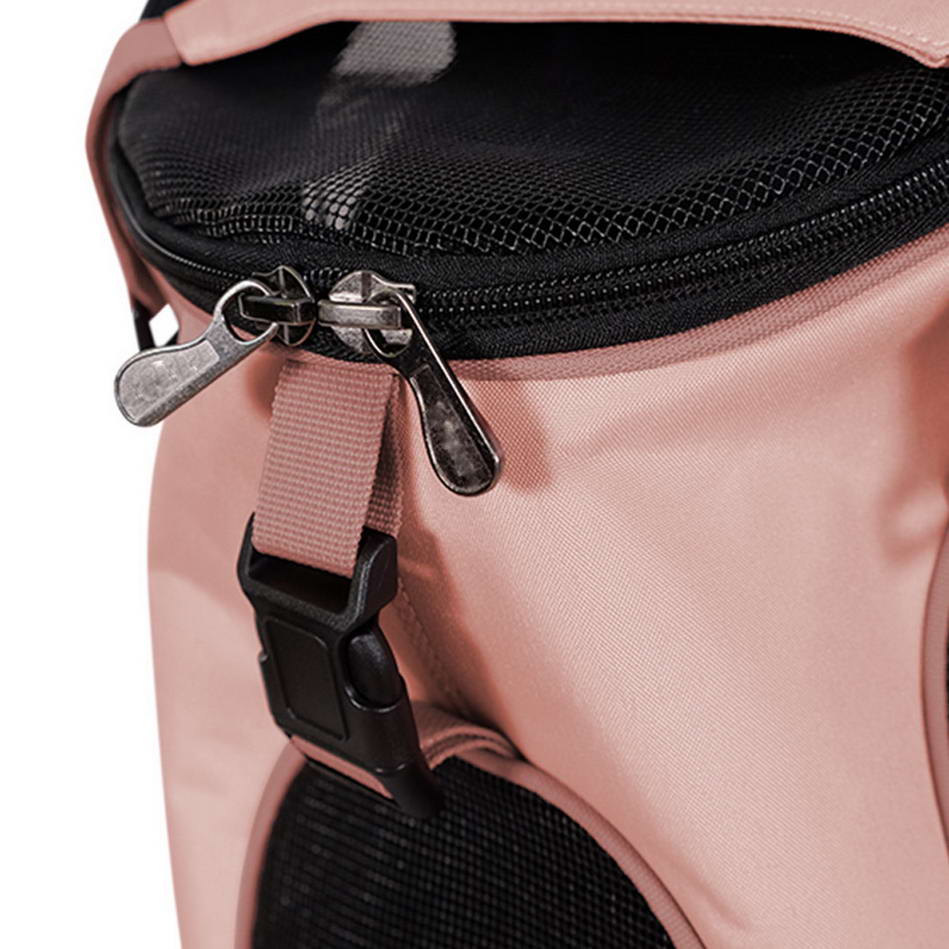 Pensada y espaciosa mochila para perros en color rosa coral