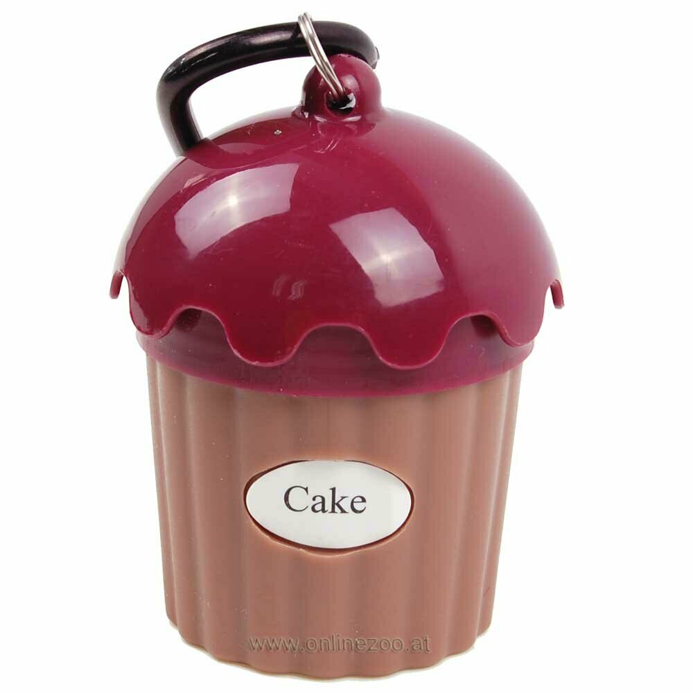Dispensador de bolsas higiénicas, con diseño divertido de Cup Cake con glaseado morado.