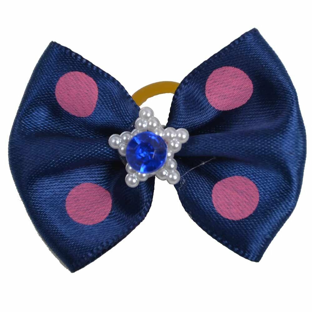 Lazo para el pelo de perros con goma elástica de GogiPet, en color azul con puntos rosas y piedra azul brillante en medio de una estrella de perlas
